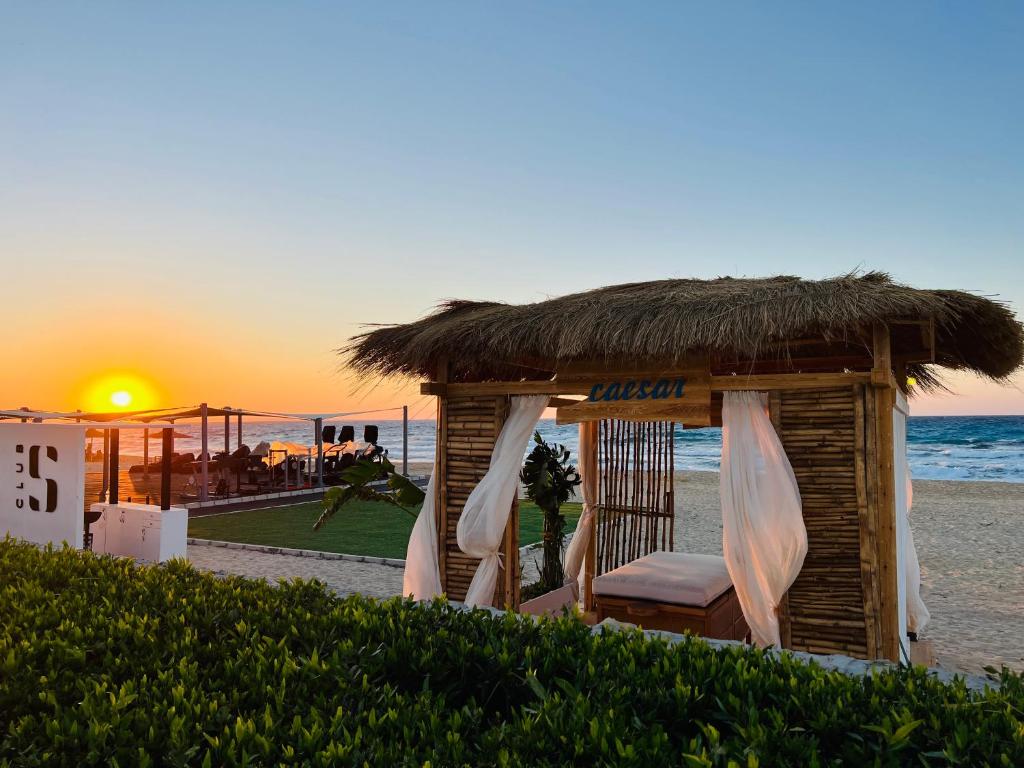 beach cabin at sunset time 